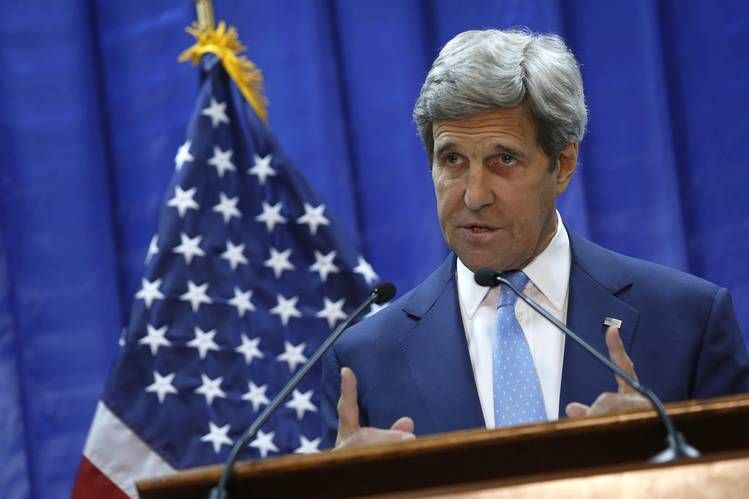 Kerry, in Kabul, aims to ease crisis over unity pact he brokered
