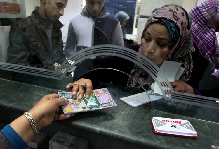 Rival currencies are set to be issued in Libya Battle of Banknotes