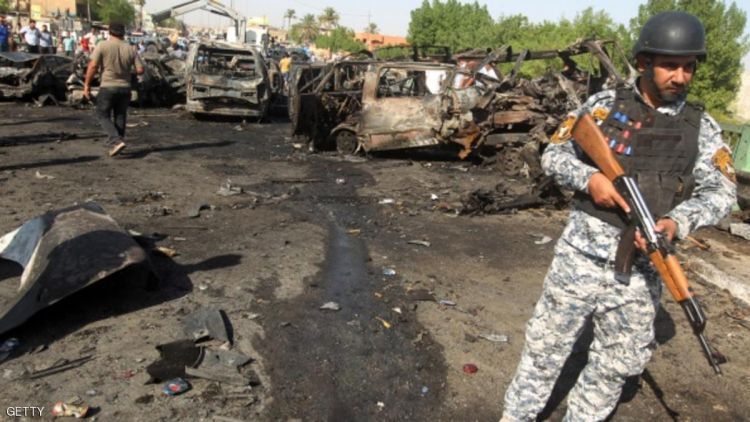 Iraq: Deaths in car bomb market attack near Baghdad