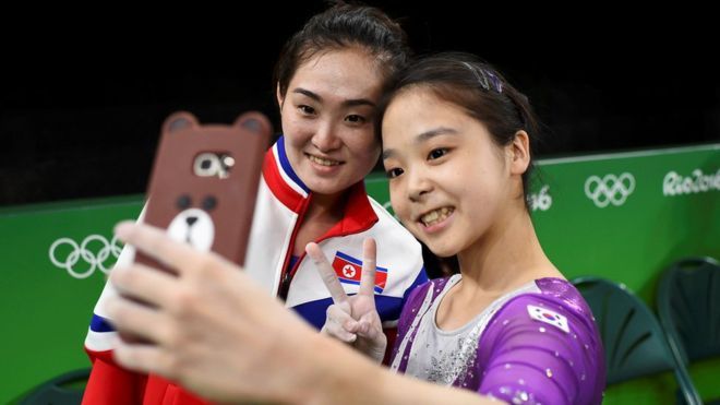 North and South Korean gymnasts pose for Olympic selfie