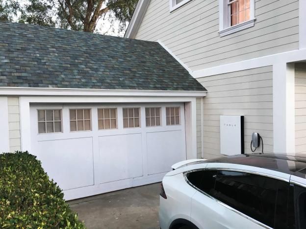 Tesla's Musk adds solar roofs to his clean energy vision