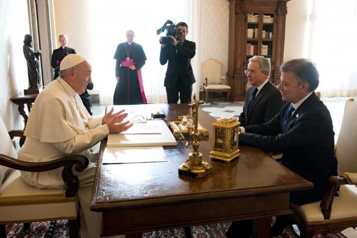 Colombia's president and opposition rival meet Pope Francis