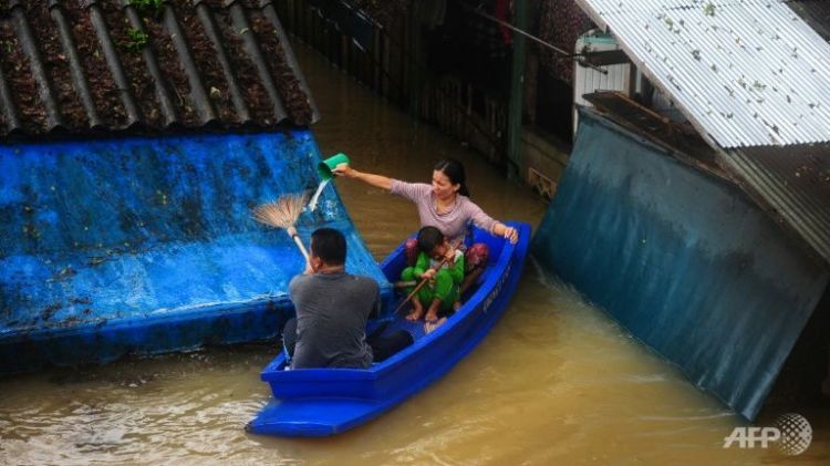12 dead as torrential rain submerges Thai south