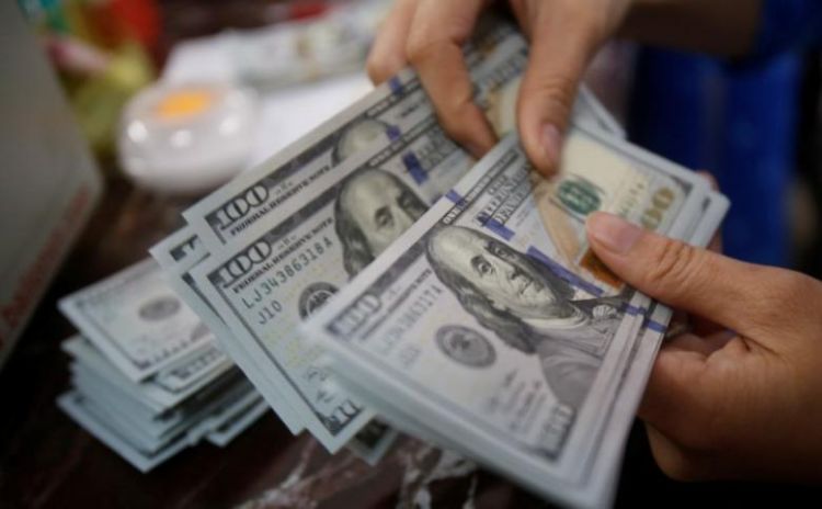 Dollar off recent highs ahead of expected Fed rate hike