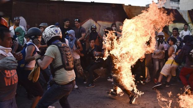 Venezuela protests: Man set alight as death toll rises