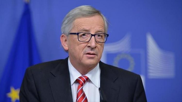 EU's Juncker warns Trump against climate deal exit