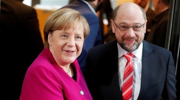 ألمانيا: ميركل وشولتز يعدان بـ”سياسة جديدة”