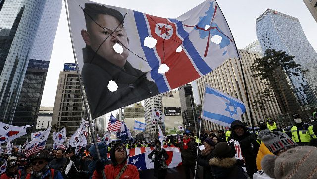 В Сеуле проходят протесты против приезда делегации КНДР на Олимпиаду
