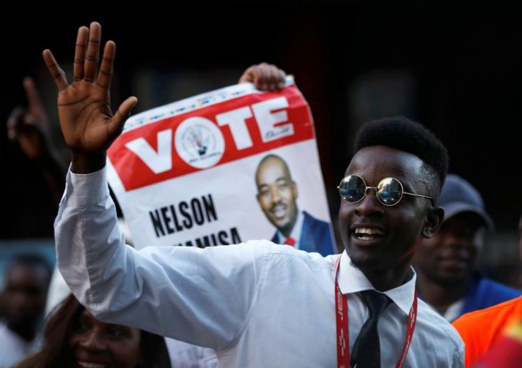 Zimbabwe's ruling party wins majority in parliament, opposition questions poll