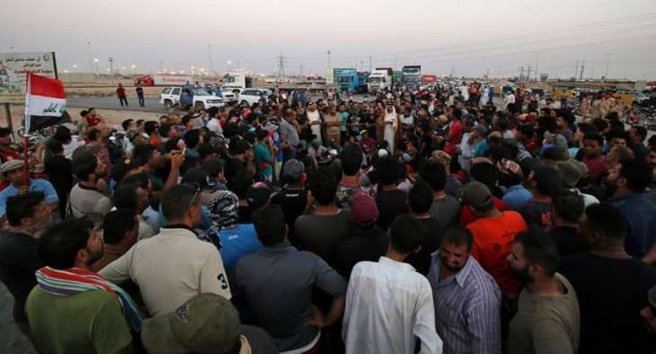 Iraqi officials impose Basra curfew amid violent protests