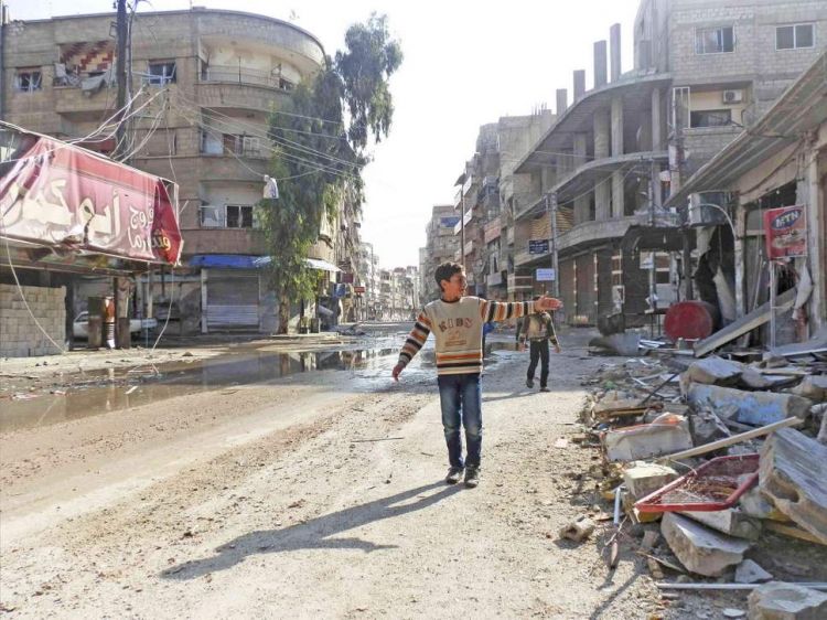 Residents of Damascus suburb Daria are returning to their homes