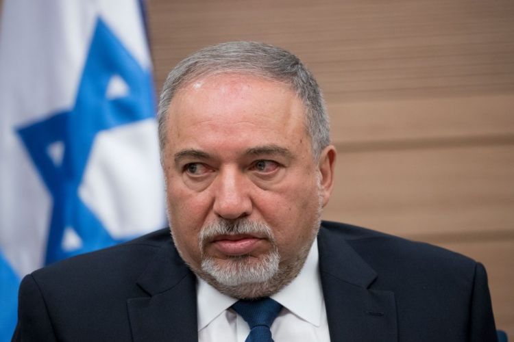 Hamas celebrates 'political victory' Lieberman resigned