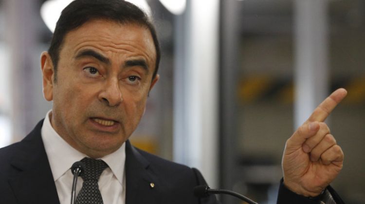 Ex-Nissan chief Ghosn charged, served with fresh arrest warrant