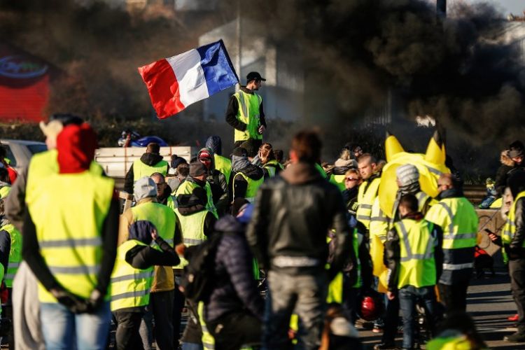 Tax rises, yellow vests and a gold desk Emmanuel Macron's humbling year