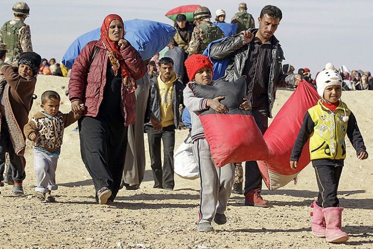 Hundreds of Syrians return home from Lebanon