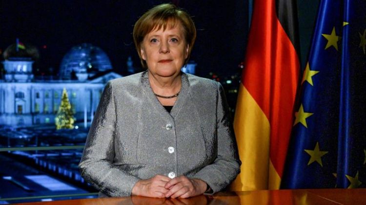 Angela Merkel Germany will take on more global responsibility