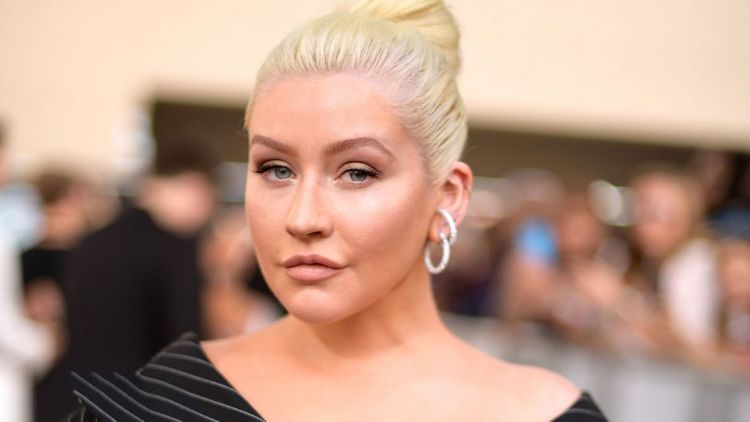 Christina Aguilera lauds Lady Gaga for speaking out against R. Kelly