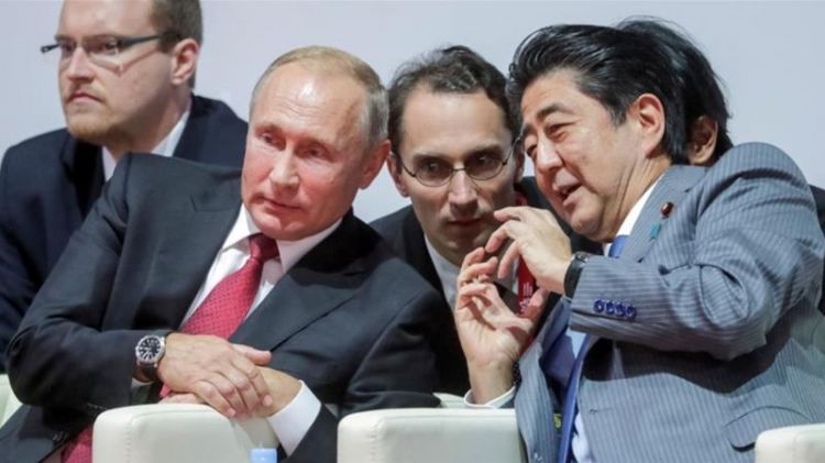 Putin hosting Abe for talks to break 70-year island deadlock