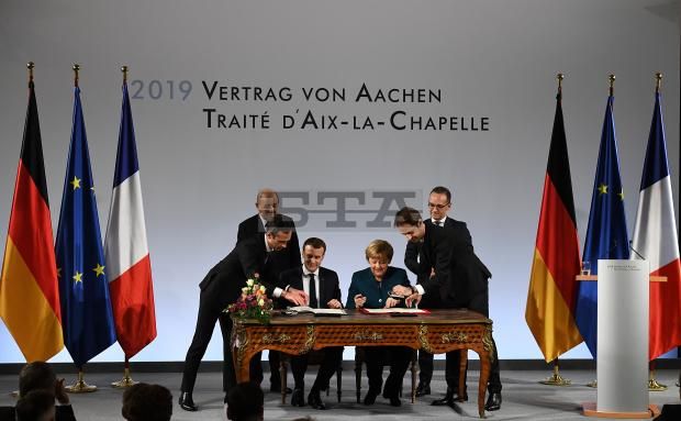 Merkel and Macron sign Treaty of Aachen to revive EU