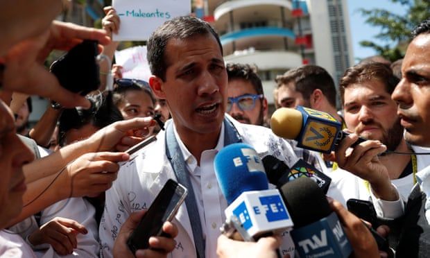 Venezuela's Guaidó urging west to keep up pressure, says Hunt