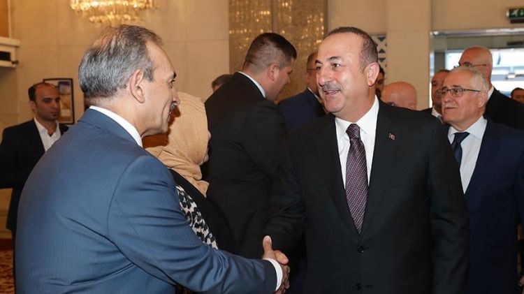 تشاووش أوغلو يلتقي النواب التركمان ببغداد