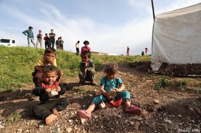 Up to 2 million Syrians could flee to Turkey if clashes worsens UN says