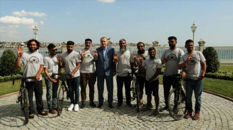 Eight british people arrive in saudi arabia on BICYCLES to perform Hajj