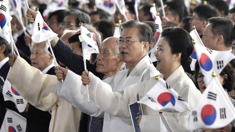 South Korea's Moon signals talks with Japan as trade war simmers