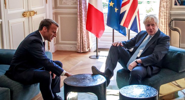 Boris Johnson Takes Flak for ‘Bad Manners’ as He Puts Foot Up on Table During Talks With Macron