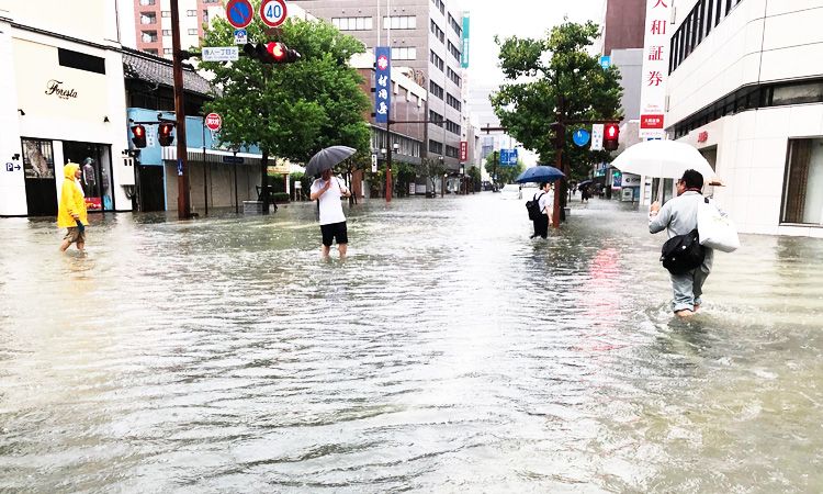 Two dead as Japan orders 670,000 to flee heavy rains
