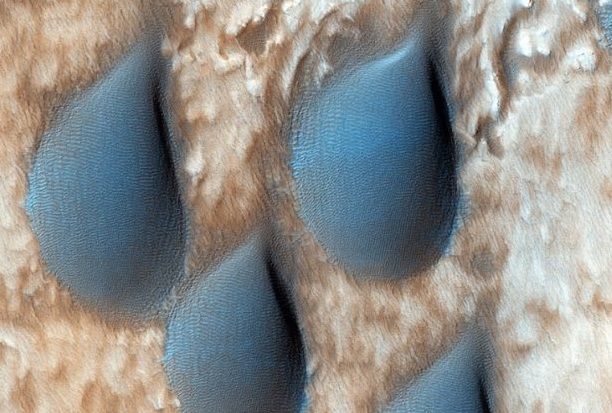 It hasn't rained on Mars for a long time Look at these sand dunes look like raindrops
