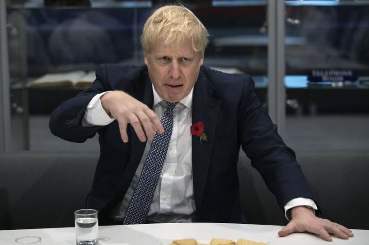 UK’s Boris Johnson apologizes for missing Brexit deadline