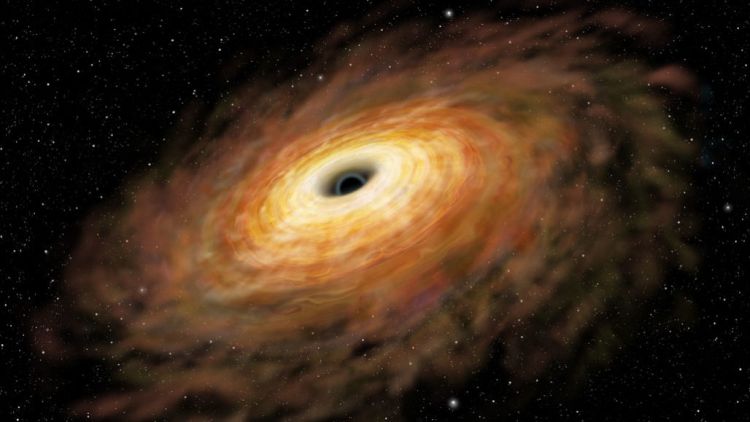 Scientists discover 'monster' black hole that's so big it shouldn't exist