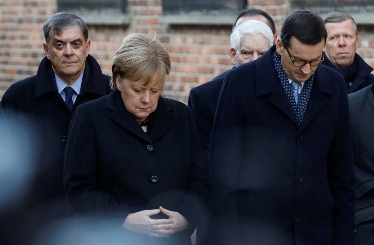 Merkel pays first visit as chancellor to Auschwitz death camp