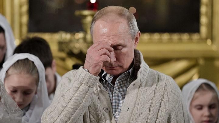 Putin attends to mark Orthodox Christmas service