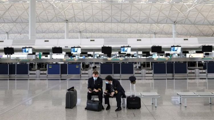 الصين تعلق الرحلات التجارية في مطار هونج كونج مع 150 دولة