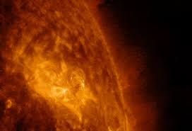 NASA catches the flash of a solar flare going into space