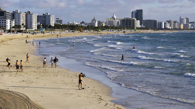 Helicopter crashes into sea near Miami Beach swimmers