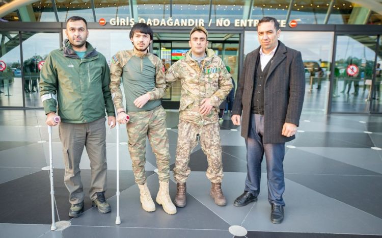Еще трое ветеранов вернулись на родину после лечения в Турции