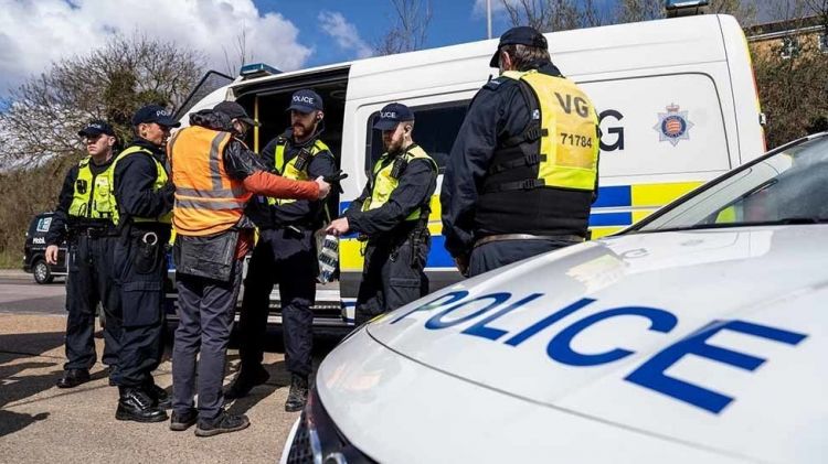 UK police arrest 83 as climate activists blockade oil terminals