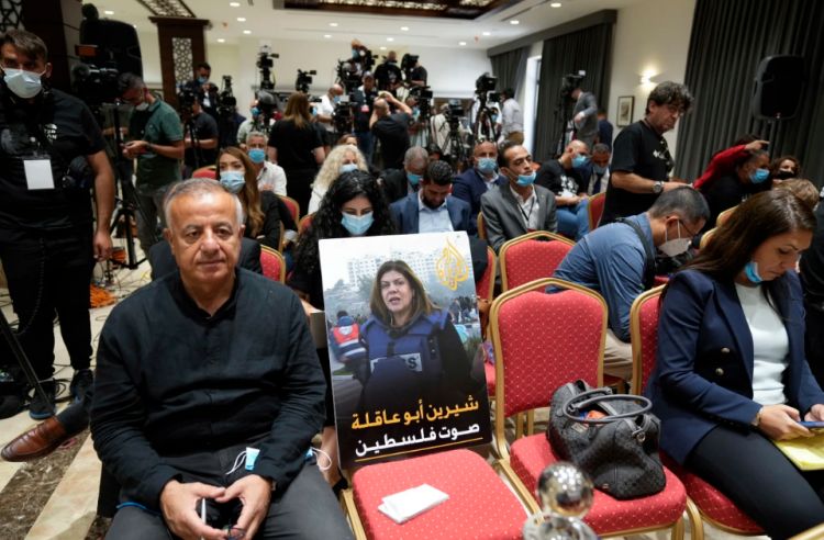 Slain Palestinian journalist's picture placed on front row of Biden news conference