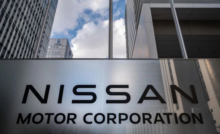 Nissan keeps annual profit forecasts, cuts unit sales target