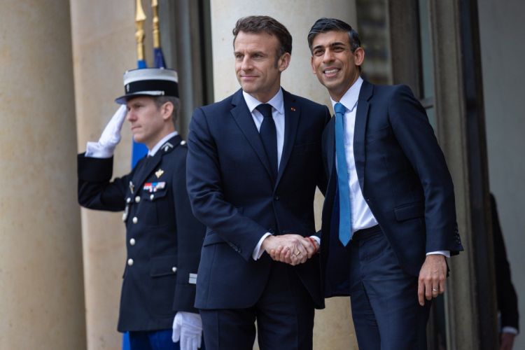 UK's PM meets Emmanuel Macron in Paris