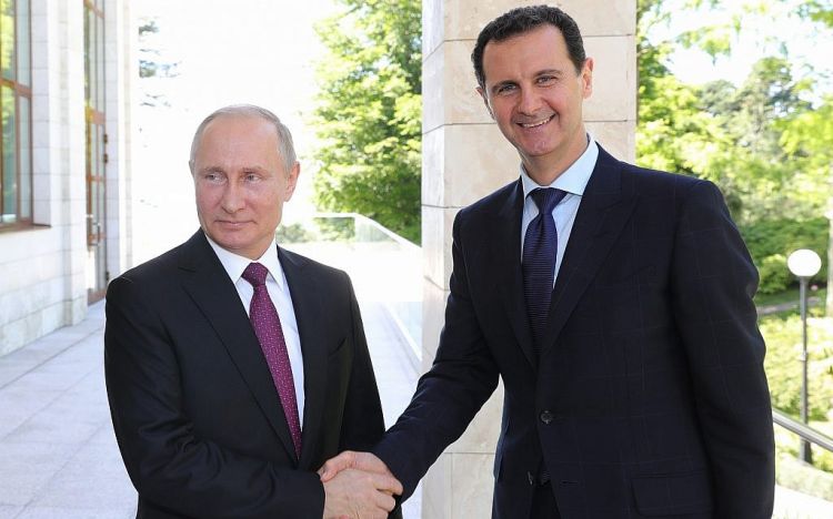 Putin met with Assad