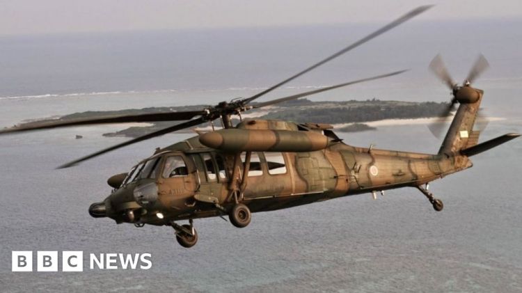 Japan army helicopter wreckage found with five bodies
