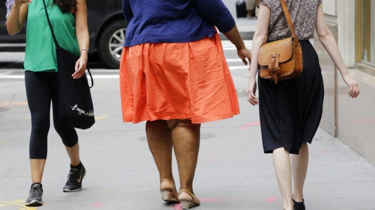 زيادة الوزن عند المرأة مقارنة بالرجل
