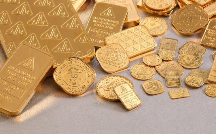 Золото подешевело на фоне переговоров о госдолге США