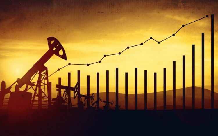 Мировые цены на нефть несколько поднимаются на ослаблении доллара