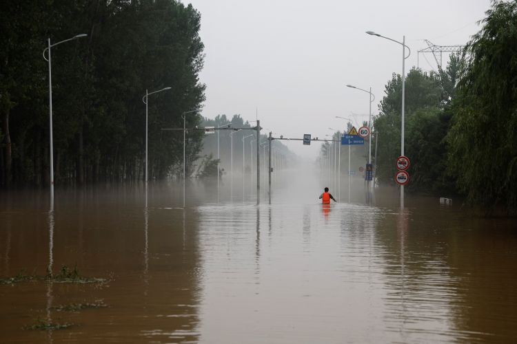 Three killed in China while trying to outrun flash flood