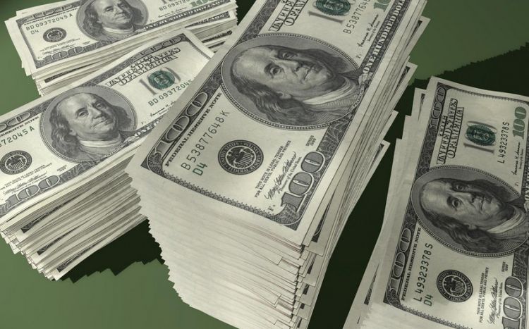 Доллар подешевел к мировым валютам в ожидании статданных